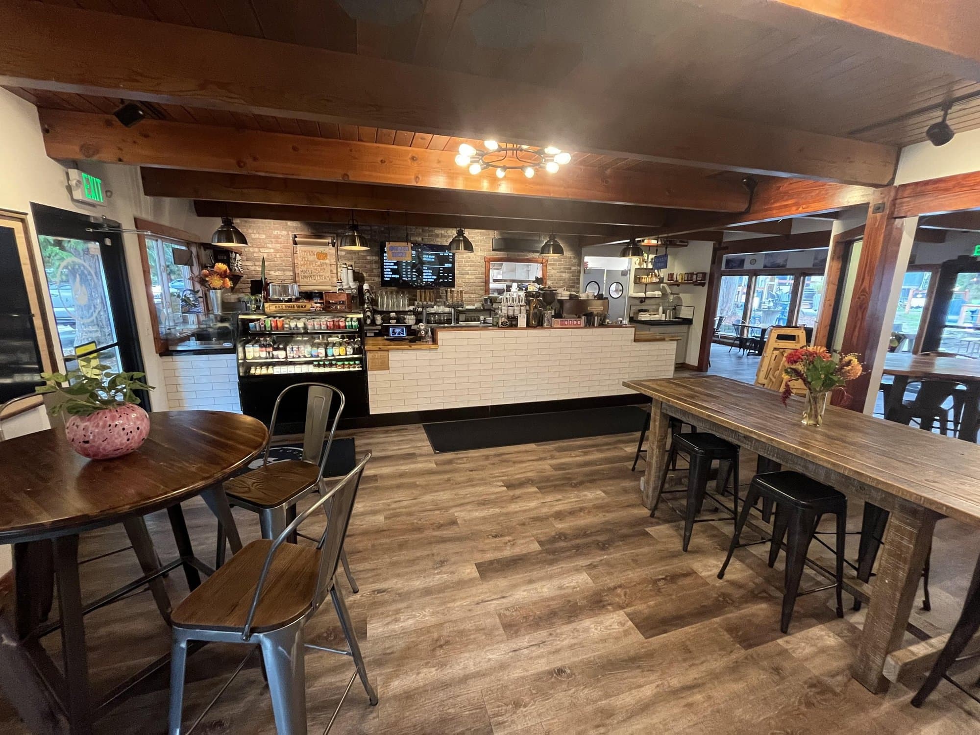 The café counter and communal tables inside South Fork